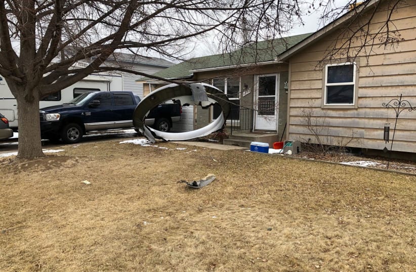 General view of plane debris in Broomfield, Colorado, U.S., February 20, 2021 in this picture obtained from social media. (photo credit: BROOMFILED POLICE VIA REUTERS)