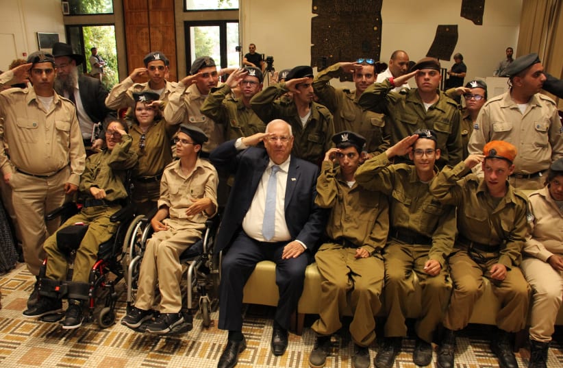 President Reuven Rivlin honors soldiers from Special in Uniform as he celebrates their contributions to the Israel Defense Forces. (photo credit: JNF USA)