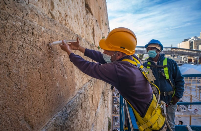 The Western Wall stones are injected with a special mixture to preserve and reinforce them (photo credit: YANIV BERMAN/IAA)