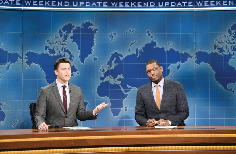 ANCHOR COLIN JOST (left) and anchor Michael Che during Weekend Update on ‘Saturday Night Live’ last year. (photo credit: WILL HEATH/NBC/TNS)