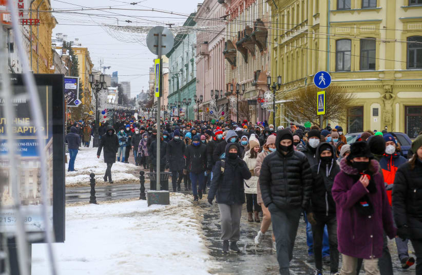 Opposition political leader Alexey Navalny's supporters seen marching in (photo credit: Courtesy)