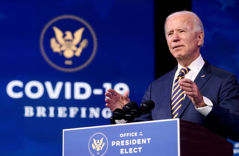 US President-elect Joe Biden delivers remarks on the US response to the coronavirus disease (COVID-19) outbreak, at his transition headquarters in Wilmington, Delaware, US, December 29, 2020. (photo credit: REUTERS/JONATHAN ERNST/FILE PHOTO)