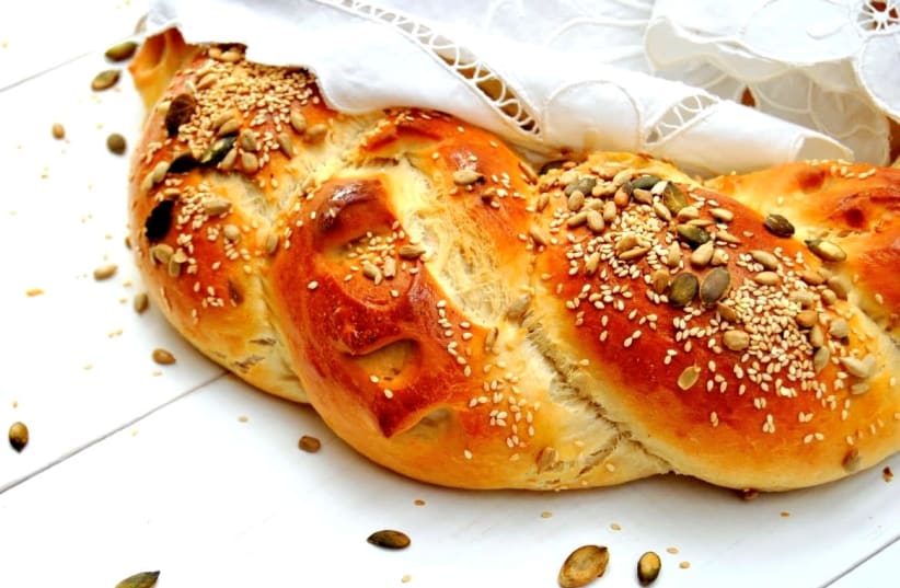 Sweet challah with seeds (photo credit: PASCALE PEREZ-RUBIN)