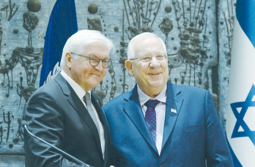 GERMAN PRESIDENT Frank Walter Steinmeier is greeted by President Reuven Rivlin during a visit to Jerusalem in 2017. (photo credit: MARK NEYMAN/GPO)