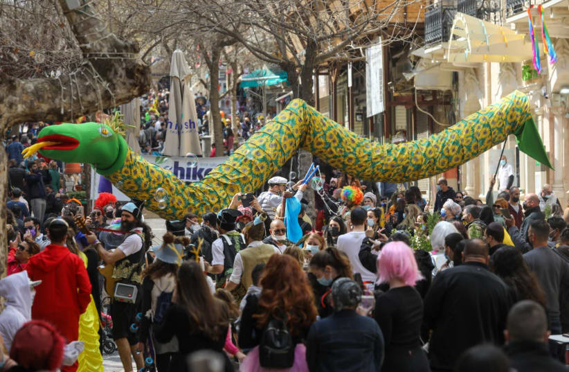 Shushan Purim celebrations amid ongoing coronavirus outbreak in Jerusalem, Feb. 28, 2021 (photo credit: MARC ISRAEL SELLEM)