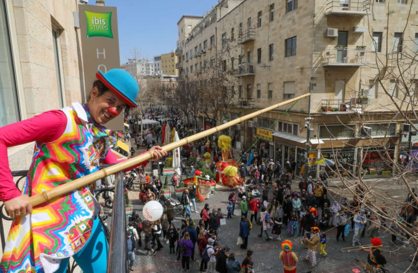 Shushan Purim celebrations amid ongoing coronavirus outbreak in Jerusalem, Feb. 28, 2021 (photo credit: MARC ISRAEL SELLEM)