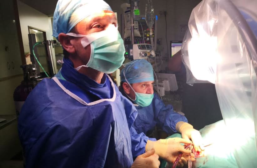 The transplant operation being performed at Bellinson Medical Center.   (photo credit: Courtesy)