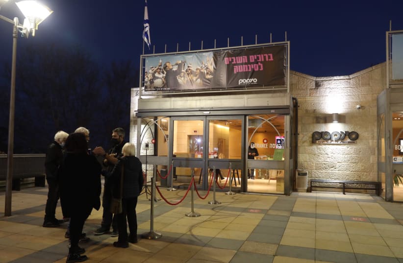 Israelis standing outside of the cinemateque in Jerusalem, March 1, 2021  (photo credit: MARC ISRAEL SELLEM/THE JERUSALEM POST)