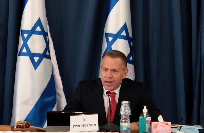Former Israeli Minister Gilad Erdan attends a weekly cabinet meeting at the Foreign Ministry, amid the spread of the coronavirus disease (COVID-19), in Jerusalem. (photo credit: REUTERS)