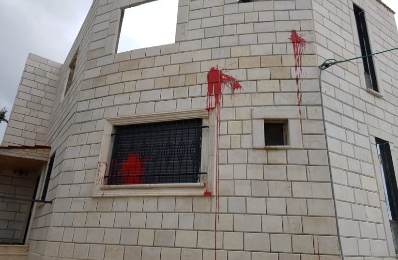 Red paint bomb thrown at a house at the Palestinian village of Hawara in the West Bank, Wednesday, March 3, 2021.  (photo credit: HAWARA MUNICIPALITY AND YESH DIN)