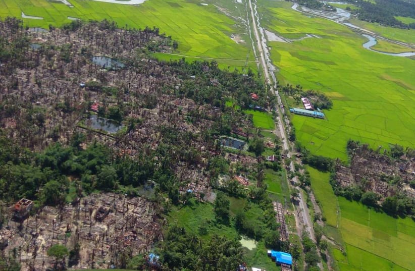 A burnt village is seen from an aerial view in the Rakhain state in Myanmar, a month after the Myanmar Military committed what the UN refers to as a genocide against the Muslim minority Rohingya people, October, 2017. (photo credit: Courtesy)
