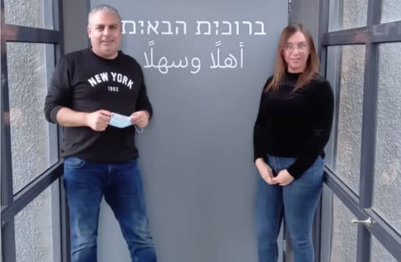 In honor of International Women's Day, Keter has put up signs across its eight facilities that say 'Welcome' to men and women in Hebrew and Arabic. Designed by Michal Shomer.  (photo credit: O-PRODUCTIONS)