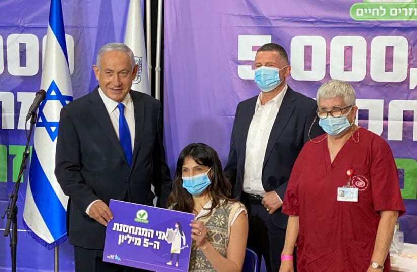 Janet Lavie-Azoulay, the five millionth Israeli to receive the coronavirus vaccine, meets with Prime Minister Benjamin Netanyhau and Health Minister Yuli Edelstein, March 8, 2020 (photo credit: PRIME MINISTER'S OFFICE)