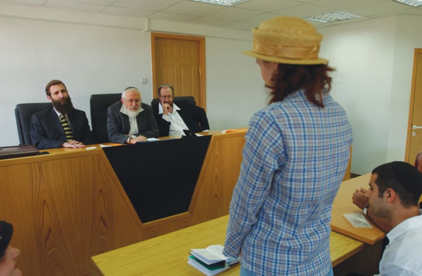 A WOMAN converts to Judaism in the Jerusalem Rabbinic Court (photo credit: FLASH90)