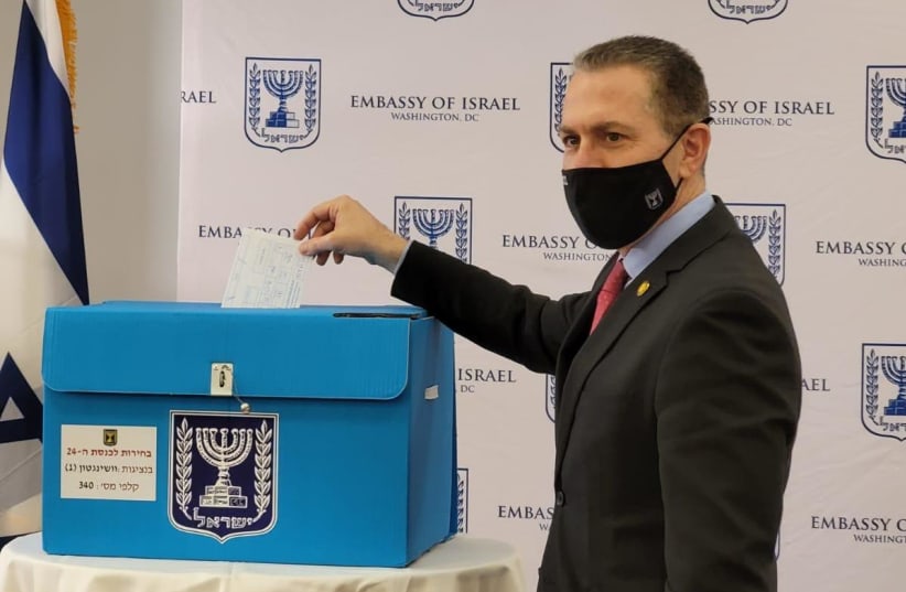 Israel's Ambassador to the US Gilad Erdan voting in the US  (photo credit: Courtesy)