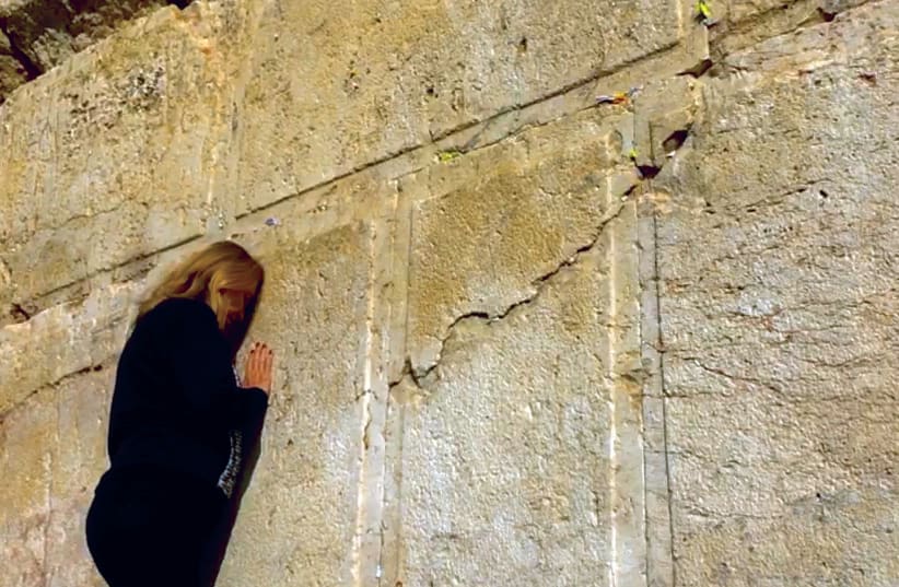 PRAYING AT the Western Wall – five years after first being approved, the Kotel Agreement remains suspended but not forgotten. (photo credit: Courtesy)