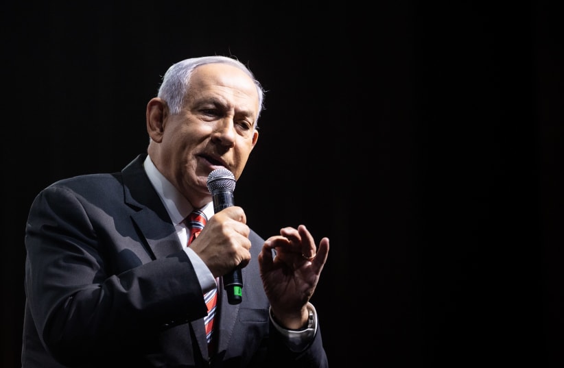 Israeli Prime Minister Benjamin Netanyahu speaks at the annual Jerusalem Conference of the 'Besheva' group in Jerusalem, March 14, 2021 (photo credit: YONATAN SINDEL/FLASH 90)
