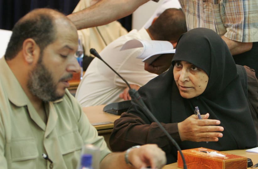 Palestinian lawmaker Jamilah al-Shanti (R) of Hamas attends a parliament session in Gaza July 22, 2007. The parliament session for a vote of confidence was cancelled because Fatah lawmakers did not attend. (photo credit: MOHAMMED SALEM/ REUTERS)