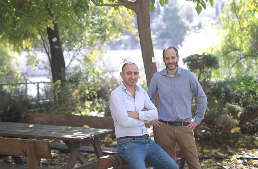 Teramount cofounders Hesham Taha and Avi Israel. (photo credit: ILAN ASSAYAG)