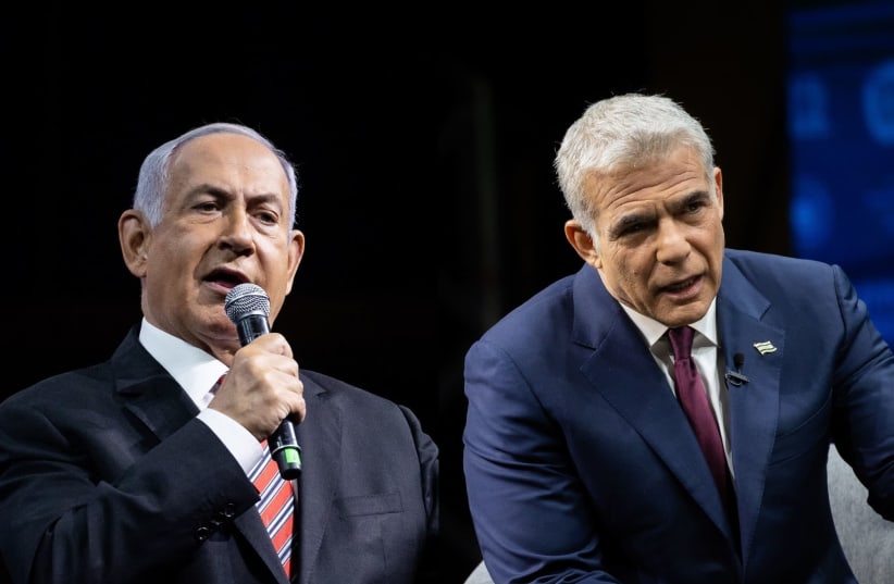 Opposition leader Benjamin Netanyahu and alternate Prime Minister, Yesh Atid leader Yair Lapid  (photo credit: YONATAN SINDEL/FLASH90)