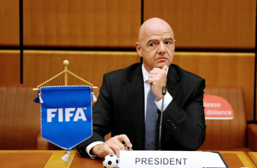 FIFA President Gianni Infantino waits for the start of a signing ceremony at the United Nations Office on Drugs and Crime (UNODC) headquarters in Vienna, Austria September 14, 2020.  (photo credit: LEONHARD FOEGER / REUTERS)