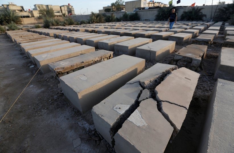 A Jewish cemetery is seen at the Sadr City district of Baghdad, Iraq (photo credit: WISSIM AL-OKILI/REUTERS)