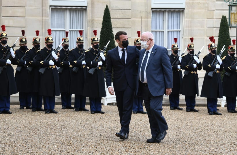 French President Emmanuel Macron and President Reuven Rivlin at the Palais de l’Elysee in Paris, France.  (photo credit: AMOS BEN-GERSHOM/GPO)