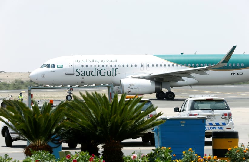 A Saudi Gulf Airlines Airbus A320-200 airplane is seen at Saudi Arabia's Abha airport, after it was attacked by Yemen's Houthi group in Abha, Saudi Arabia June 13, 2019 (photo credit: REUTERS)