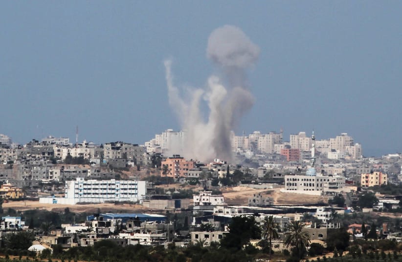 SMOKE RISES from the Gaza Strip following an IDF military strike, August 2014.  (photo credit: ALBERT SADIKOV/FLASH90)