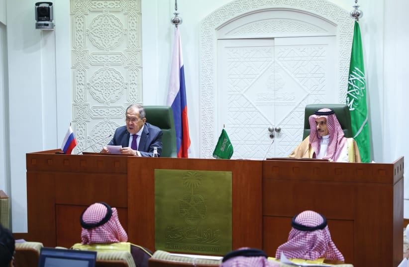 SAUDI ARABIAN Foreign Minister Prince Faisal bin Farhan Al-Saud listens as Russia Foreign Minister Sergei Lavrov speaks at a news conference in Riyadh on March 10. (photo credit: RUSSIAN DEFENSE MINISTRY/HANDOUT VIA REUTERS)