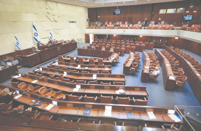 A PLENARY SESSION at the Knesset in Jerusalem awaits the arrival of more parliamentarians in August 2020 (photo credit: OREN BEN HAKOON/FLASH90)