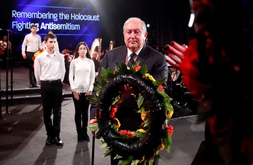 ARMENIAN PRESIDENT Armen Sarkissian takes part in a wreath-laying ceremony at Yad Vashem – The World Holocaust Remembrance Center, in Jerusalem last year. (photo credit: RONEN ZVULUN/REUTERS)