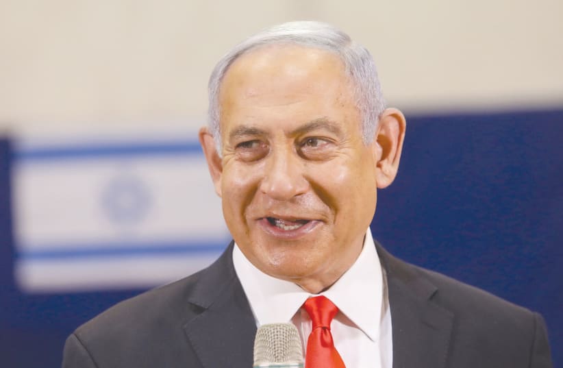 PRIME MINISTER Benjamin Netanyahu speaks after casting his vote in Jerusalem during the Knesset elections last week. (photo credit: MARC ISRAEL SELLEM/THE JERUSALEM POST)