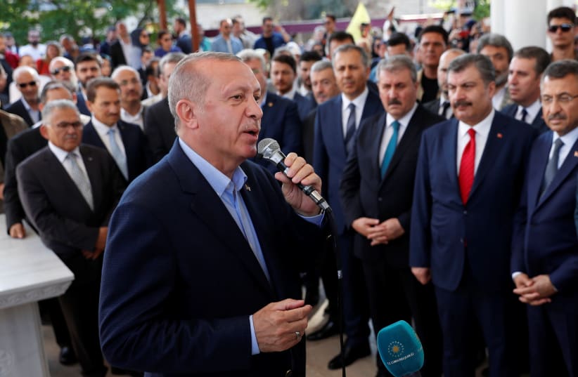 Turkish President Tayyip Erdogan speaks during a symbolic funeral prayer for the former Egyptian president Mohamed Mursi at the courtyard of Fatih Mosque in Istanbul, Turkey, June 18, 2019. (photo credit: REUTERS/MURAD SEZER)