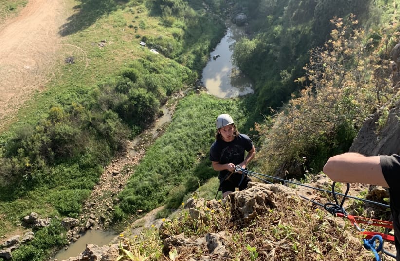 SHLOMO JAFFE prepares to rappel down Shilat Cliff. (photo credit: MAAYAN HOFFMAN)