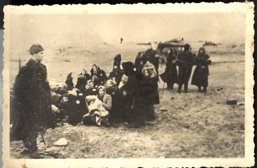 JEWISH WOMEN about to be murdered by Einsatzgruppe A and Latvian collaborators, December 1941 (photo credit: Courtesy)