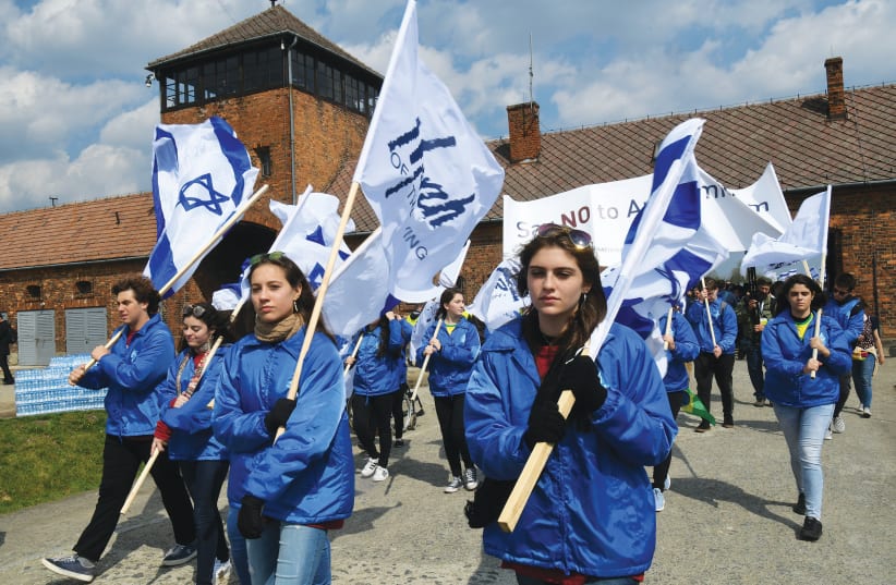 ISRAELIS PARTICIPATE in the March of the Living at the Auschwitz-Birkenau camp site in Poland in May 2019. (photo credit: YOSSI ZELIGER/FLASH90)