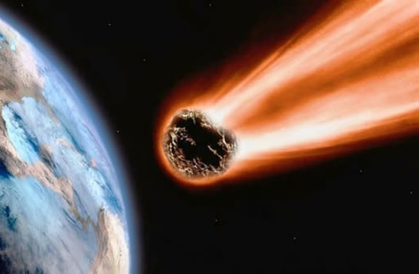 An asteroid is seen heading for Earth in an illustrative photo. (photo credit: PIXABAY)