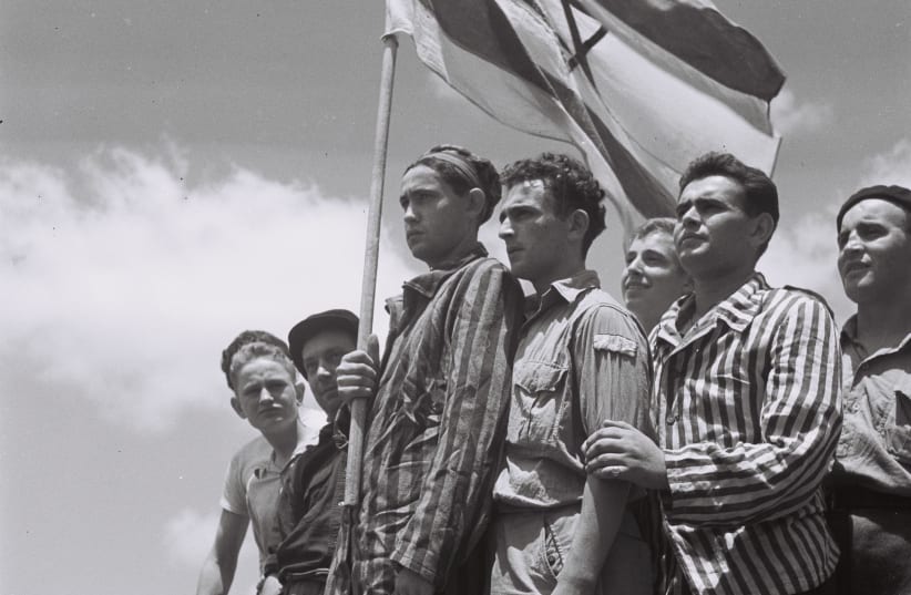 Buchenwald survivors arrive in Haifa to be arrested by the British, July 15, 1945, from "To the Promised Land" by Uri Dan (Doubleday, 1987) (photo credit: PUBLIC DOMAIN)