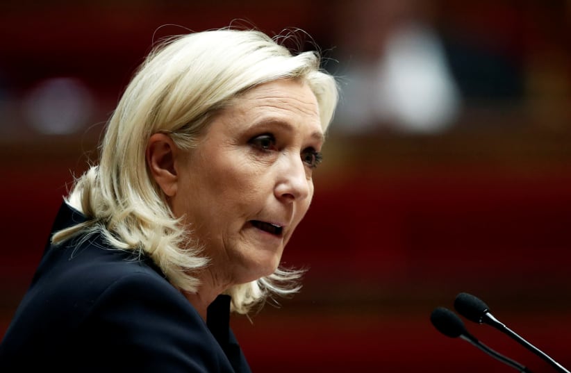Marine Le Pen, member of parliament and leader of French far-right National Rally (Rassemblement National) party, delivers a speech during a debate on migration at the National Assembly in Paris, France, October 7, 2019. (photo credit: BENOIT TESSIER/REUTERS)