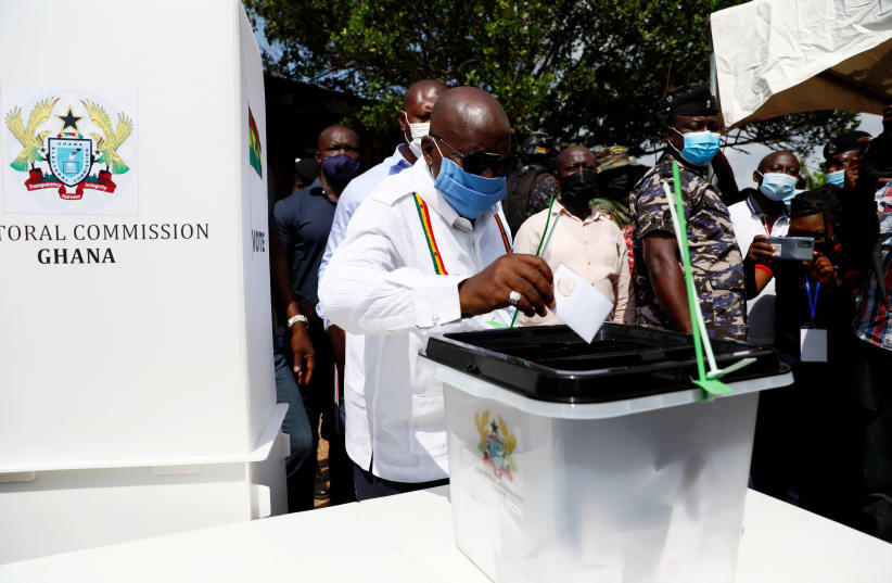 GHANA’S PRESIDENT Nana Akufo-Addo casts his ballot in Kyebi on December 7, 2020. (photo credit: FRANCIS KOKOROKO/REUTERS)