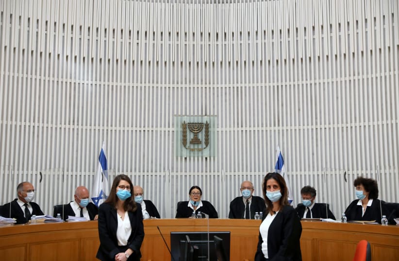 THE SUPREME Court holds a hearing last year in Jerusalem. (photo credit: ABIR SULTAN / REUTERS)