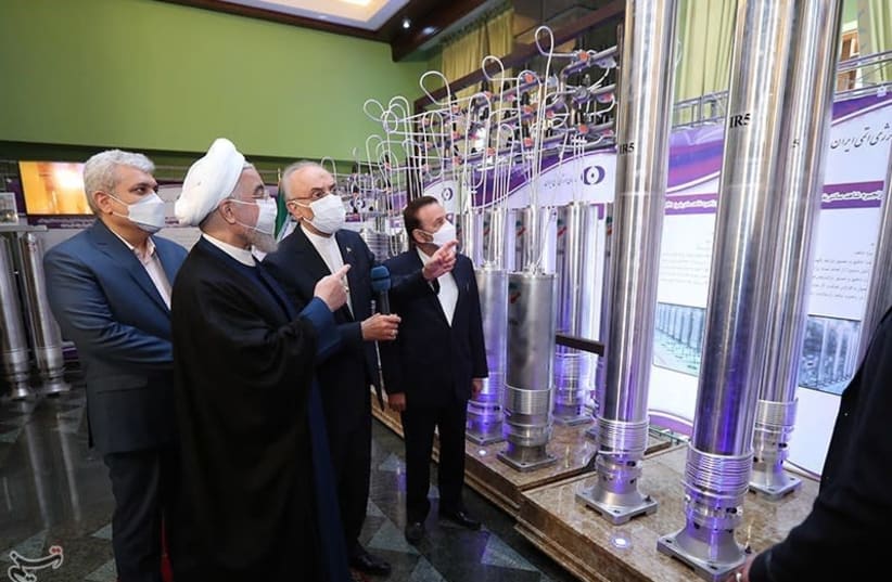 Iranian President Hassan Rouhani unveils and visits exhibition of the Atomic Energy Organization, April 10, 2021 (photo credit: PRESIDENT.IR VIA TASNIM NEWS AGENCY)