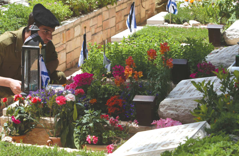 REMEMBRANCE Day is devoted to the memory of those who gave up their lives so that the State of Israel could exist today. Pictured: Mount Herzl Military Cemetery in Jerusalem. (photo credit: NATI SHOHAT/FLASH90)