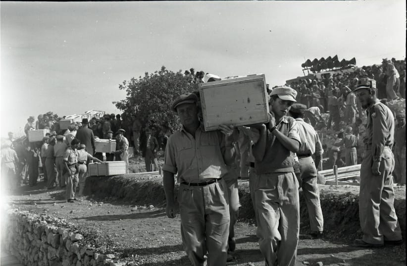 The funeral of those who fell at Gush Etzion during the War of Independence.  (photo credit: BENO ROTHENBERG/FROM THE MEITAR COLLECTION/COURTESY OF THE STATE ARCHIVE/AVAILABLE VIA THE NATIONAL)