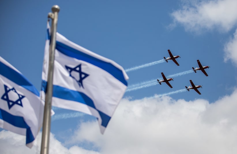Israeli air force aerobatic team fly during a military training for the upcoming Israel's 73rd Independence day in Jerusalem, on April 12, 2021.  (photo credit: YONATAN SINDEL/FLASH 90)