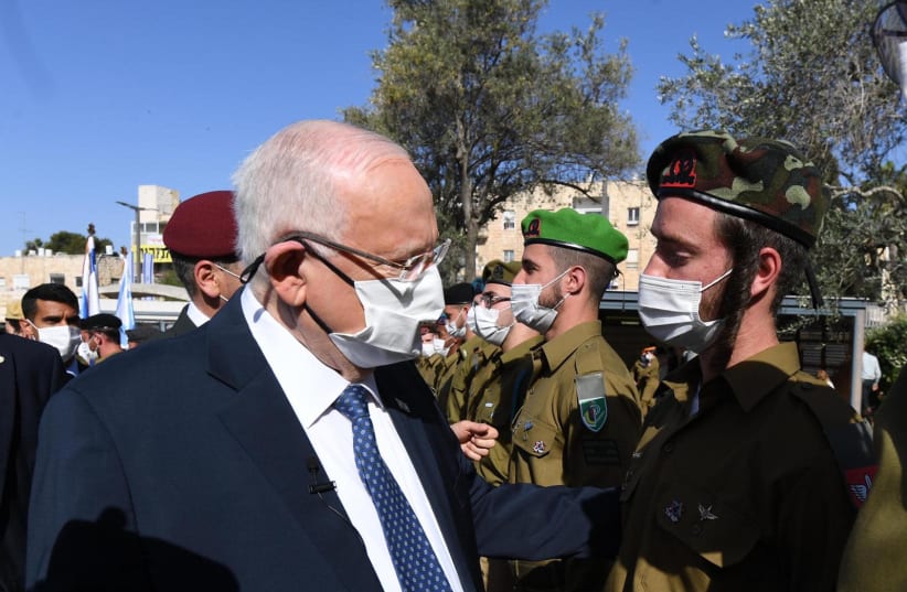 President Reuven Rivlin honors outstanding IDF soldiers at Independence Day ceremony on April 15, 2021. (photo credit: Mark Neiman/GPO)