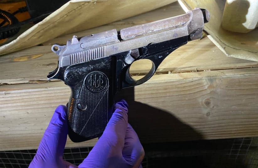 A firearm seized from the overnight brawl between two rival families in Ramle, April 16, 2021.  (photo credit: ISRAEL POLICE)