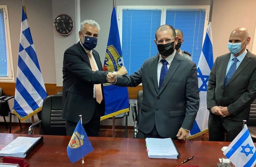 Israel, Greece sign their largest defense procurement agreement, April 18 2021  (photo credit: GREEK DEFENSE MINISTRY)