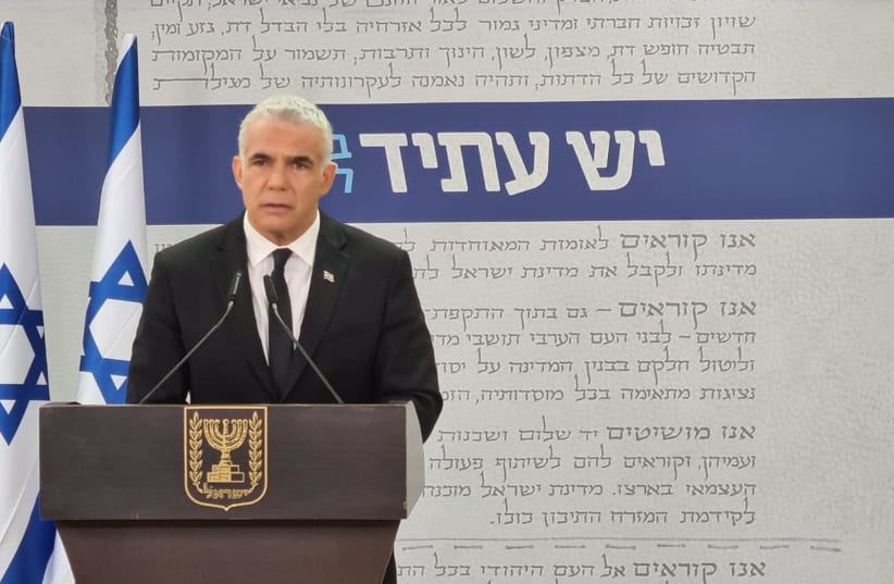 Yesh Atid Chairman Yair Lapid speaking at a press conference. (photo credit: Courtesy)